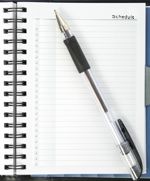 Scheduling calendar with pen Scheduling calendar with pen