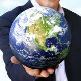 A man holding the Earth in his hand A man holding the Earth in his hand