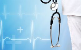 A medical person dressing in white with a stethoscope A medical person dressing in white with a stethoscope