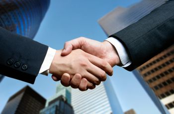 Two businessmen shaking hands Two businessmen shaking hands