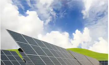 A green field of solar panels